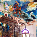 Heleen worked two years on a mural in the Sacred Heart Church, a Roman Catholic Church in the Bottom on Saba. Here she combines rainforest scenes with religious symbols
